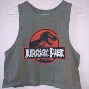 green crop tank top with jurassic park logo.